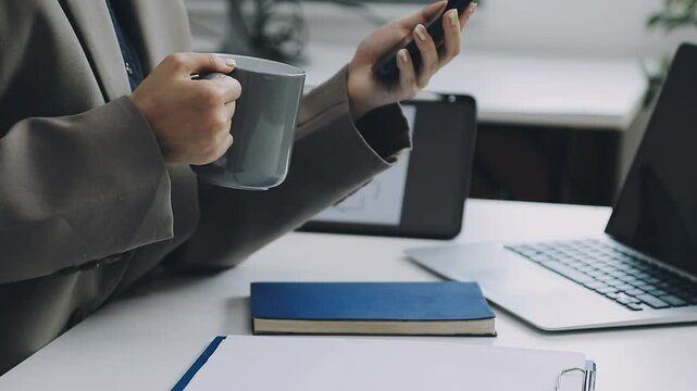 Two asian team working development of programming and encryption technology website design programmers on desk in office