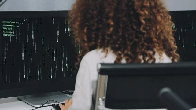 Two asian team working development of programming and encryption technology website design programmers on desk in office