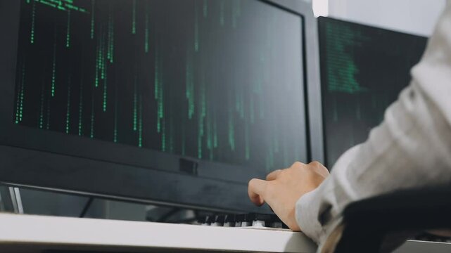 Two asian team working development of programming and encryption technology website design programmers on desk in office