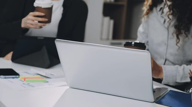 Two asian team working development of programming and encryption technology website design programmers on desk in office