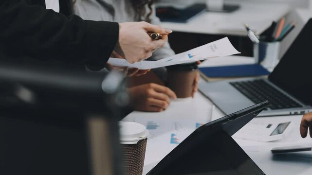Two asian team working development of programming and encryption technology website design programmers on desk in office