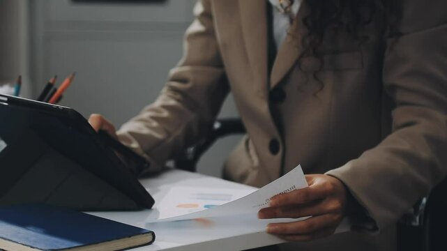 Two asian team working development of programming and encryption technology website design programmers on desk in office