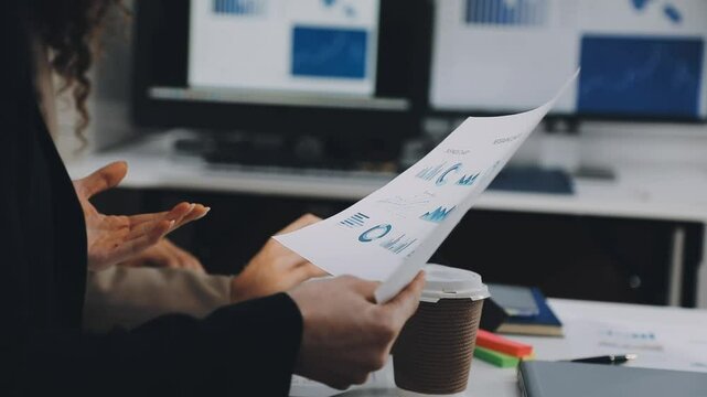 Two asian team working development of programming and encryption technology website design programmers on desk in office