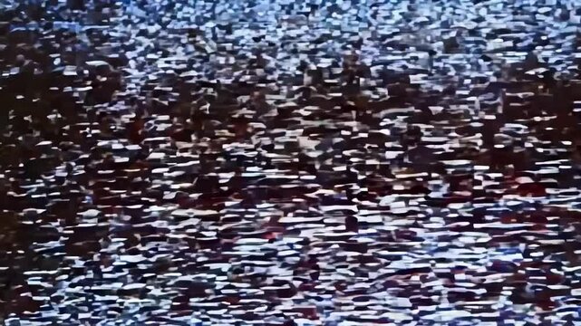 Old Television Turning On and Off with Static Noise in Dark Room