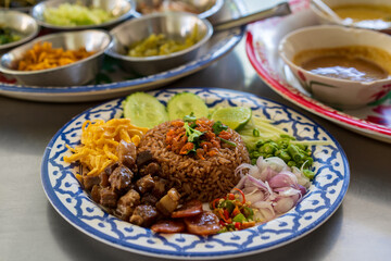 dried shrimp paste fried rice mixed with sausage egg or chopped omelet fresh chili long beans onion...