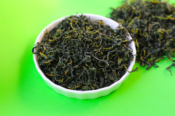 Fototapeta premium Dried mulberry leaves, commonly used for herbal tea and traditional remedies.