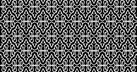 Elegant black and white decorative pattern with ornate symmetrical shapes, ideal for luxury packaging or textile.

