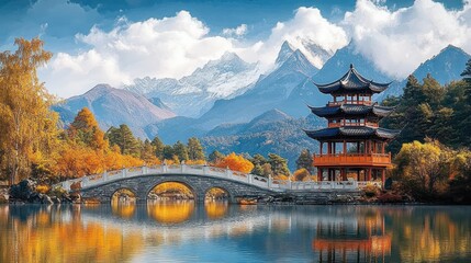 Fototapeta premium Scenic view of traditional pagoda and stone bridge over calm water with autumn trees and towering snowy mountains under partly cloudy sky