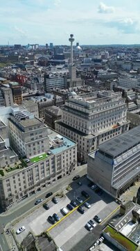 Aerial View of Historical and Modern Central Town Center and Downtown Buildings at British City Centre of Liverpool, Maritime city in northwest England, United Kingdom on Beach and Ocean Docks.