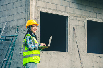 Architect works with digital construction plan and precise data during home inspection process.