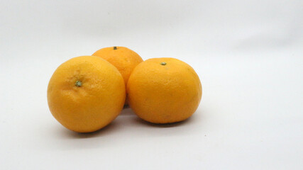Fresh oranges on white background