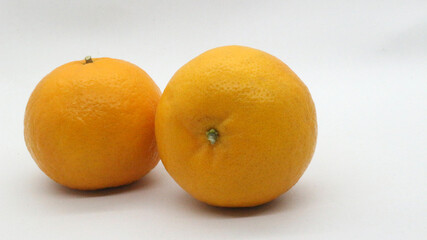Fresh oranges on white background