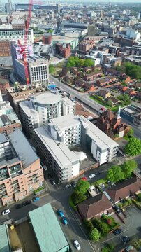 Aerial View of Historical and Modern Central Town Center and Downtown Buildings at British City Centre of Liverpool, Maritime city in northwest England, United Kingdom on Beach and Ocean Docks.