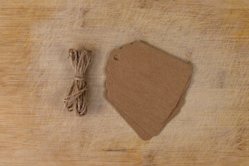 Vintage Cardboard Blank Tags Craft or Label on Wooden Surface