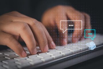 Illustrating the concept of human computer collaboration, a user's hands type a prompt on a...