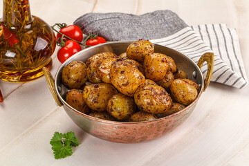 Baked mini potato with herbs