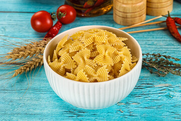Raw dry farfalle for cooking