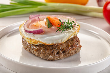 Beefsteak chop with roasted egg