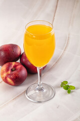 Vitamin beverage - peach juice glass
