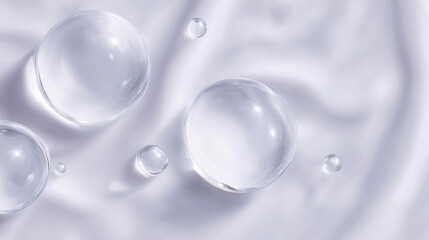 ふんわりとした布地の上に浮かぶ大きな泡の幻想的なイメージ（美容・コスメ・IT）