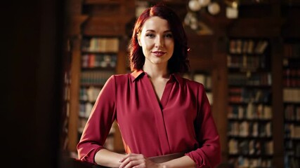 A confident woman in a red blouse stands in a vintage library, surrounded by books, conveying a sense of knowledge and sophistication - teacher and sexy - Powered by Adobe