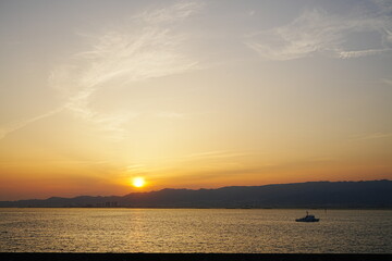 Naklejka premium Sunset View of Osaka Bay in Osaka, Japan - 日本 大阪湾の夕日