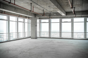 empty pure commercial office building undecorated in gray colors.open space office