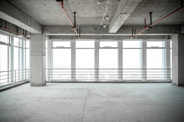 empty pure commercial office building undecorated in gray colors.open space office