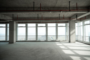 empty pure commercial office building undecorated in gray colors.open space office