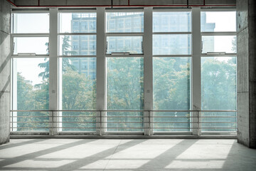 empty pure commercial office building undecorated in gray colors.open space office