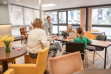 Office Meeting Women Business Casual Gathering for Collaboration & Planning During Daytime