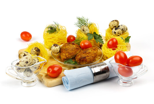Pasta nests with cherry tomatoes and quail eggs
