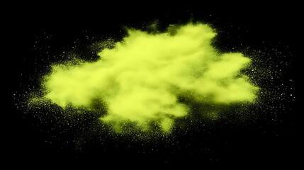 Yellow colored powder cloud floating against a black background