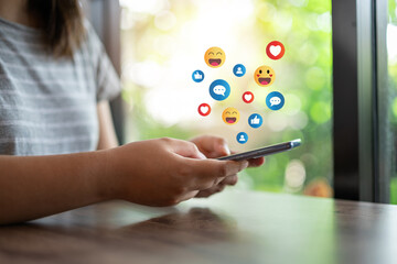 Social Distancing ,Working From Home concept..The concept of living on vacation and playing social media. Social media and digital online concept, man using smart phone with Social media.