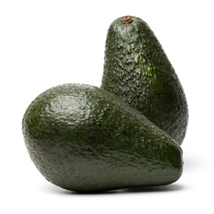 Two Ripe organic green avocado fruits isolated on white background with built-in clipping path