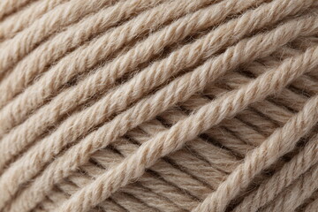 Evenly woven rope with rich fiber detail and a smooth finish. Versatile background for textile branding, knitting blogs, or artisan shops.

