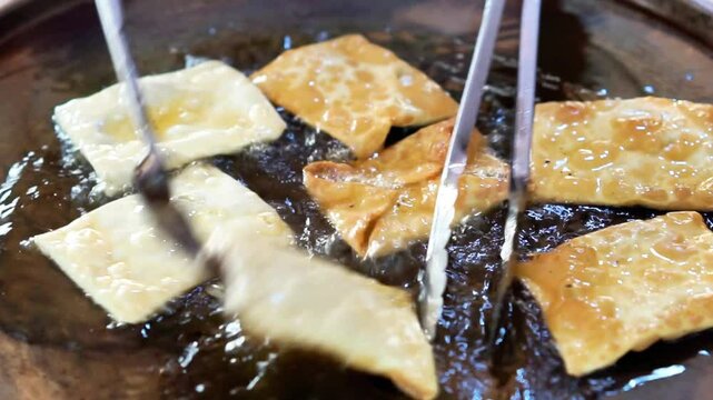 Martabak Telur. Savory pan-fried pastry stuffed with egg, meat and spices
