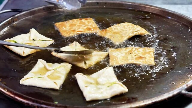 Martabak Telur. Savory pan-fried pastry stuffed with egg, meat and spices