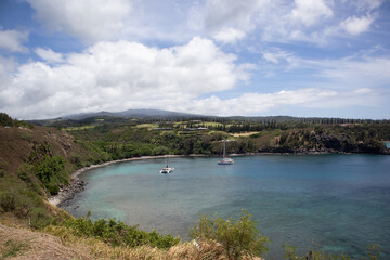 Scenic view of sailboats anchored in Honolua Bay, Maui, Hawaii