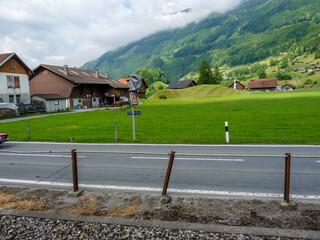 Switzerland, Meiringen, a road with a mountain in the background