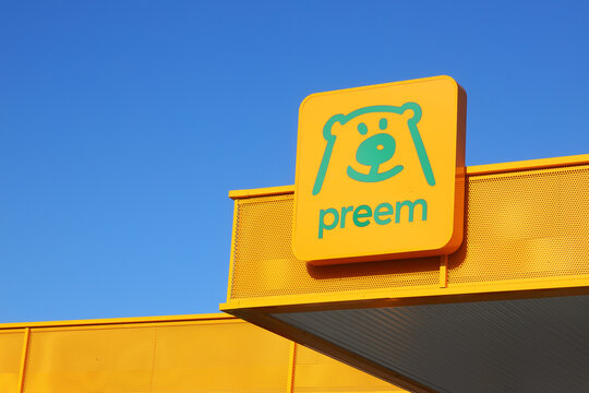 Granna, Sweden - June 3, 2025: Low angle close-up view of the Preem gasoline brand logotype at a service station against a clear blue sky.
