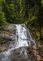 Fototapeta premium Beautiful waterfall from the Canyon of the waterfalls eco path in Smolyan, Bulgaria