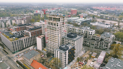Naklejka premium City expansion with tower and construction crane