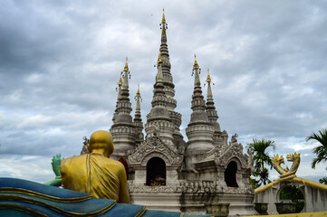 Fototapeta premium Pagoda in evening, Lanna Architecture, Symbols of Buddhism, South East Asia at Phra That Wisutthiyan Temple (Trailaksanaram Forest Temple) Doi saket, Chiang Mai, Northern Thailand