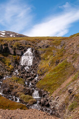 Borgarfjardarvegur Iceland, road 94 view of waterfall near road