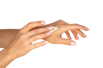 Woman applying moisturizer on tanned hands close-up. Isolated on white background. Skin care...