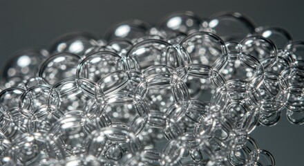 Close-up view of shimmering soap bubbles reflecting light, creating a mesmerizing abstract pattern