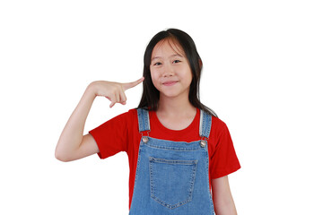 Portrait smiling Asian girl child pointing index finger at her face or hair isolated on white studio background.
