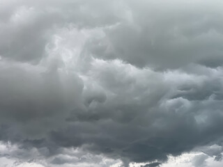 storm clouds timelapse, heavy clouds building in the sky, creating a powerful and moody scene.