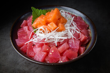 Tuna and Salmon Sashimi Rice Bowl with Shredded Daikon.